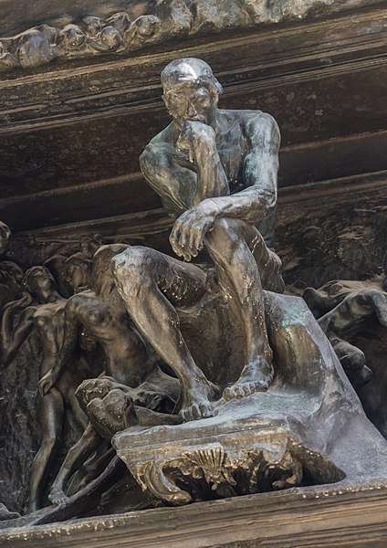 "The Thinker", at the top of the "Gates of the Hell" (1880-1890), by Rodin, bronze version at the Rodin museum of Paris.