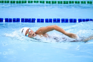 Person Swimming in Body of Water